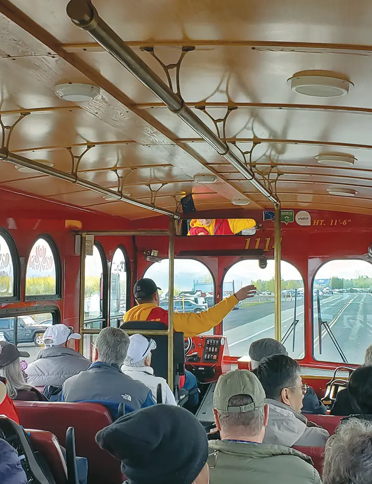 view from the rear of a full trolley on a tour