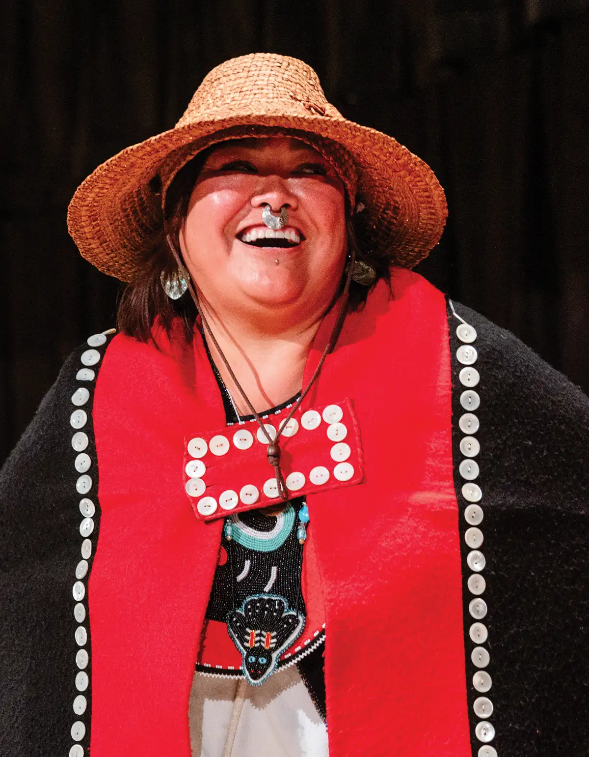 woman in traditional clothing smiling