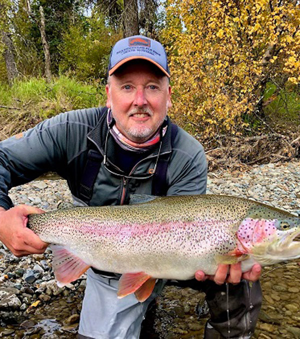 Daniel Hoffman holding a large fish 