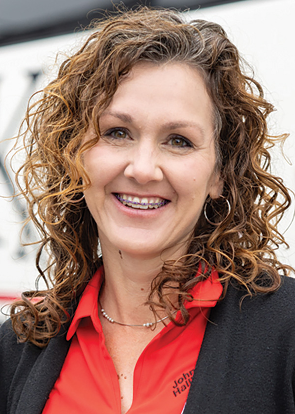 Portrait headshot photo of Rebecca Fernandez smiling