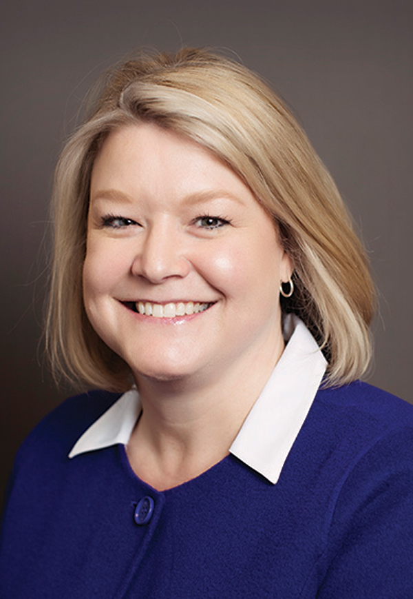 Portrait headshot photo of Jessica Graham smiling