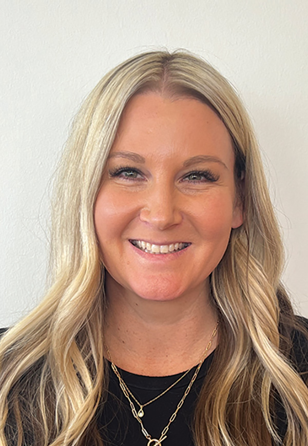 Portrait headshot photo of Nicolle Welch smiling