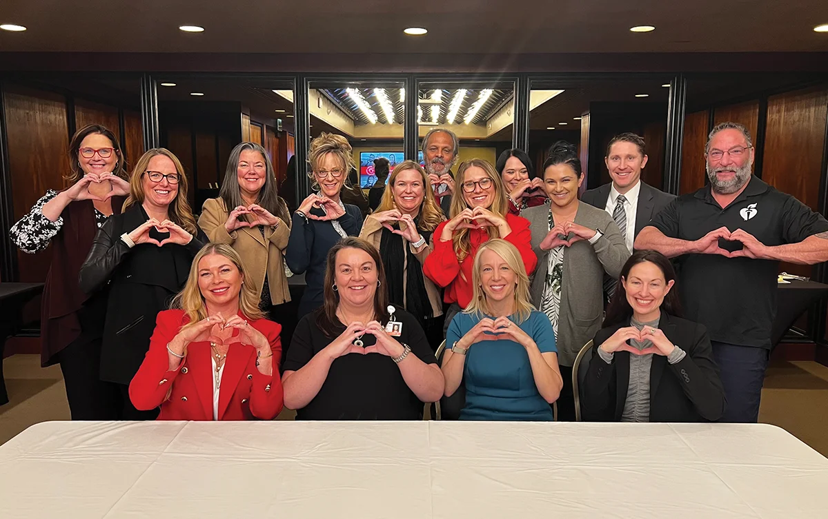 American Heart Association staff and Alaska business and medical leaders at a meeting about the state of health in Alaska