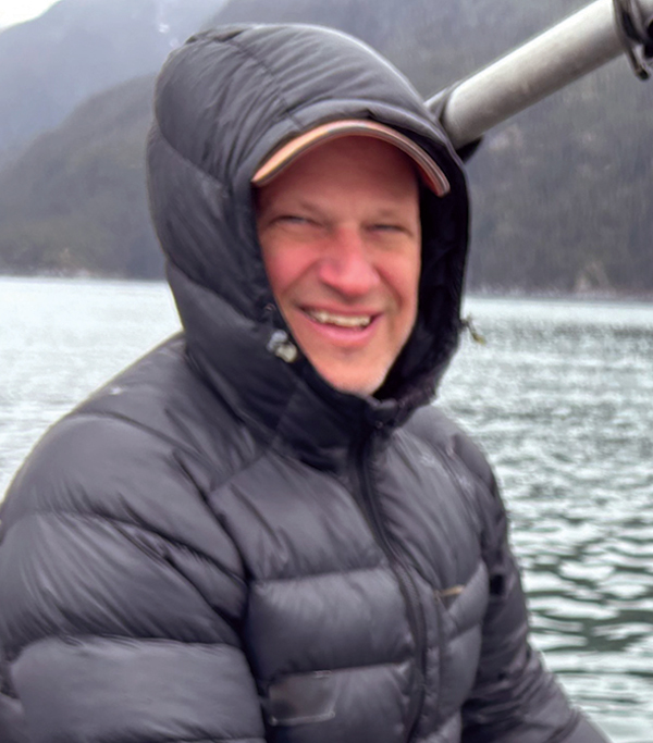 Portrait headshot photograph of Brad Ryan smiling