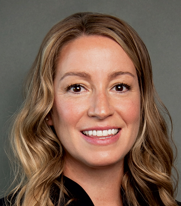 Portrait headshot photograph of Karri Wiggers smiling