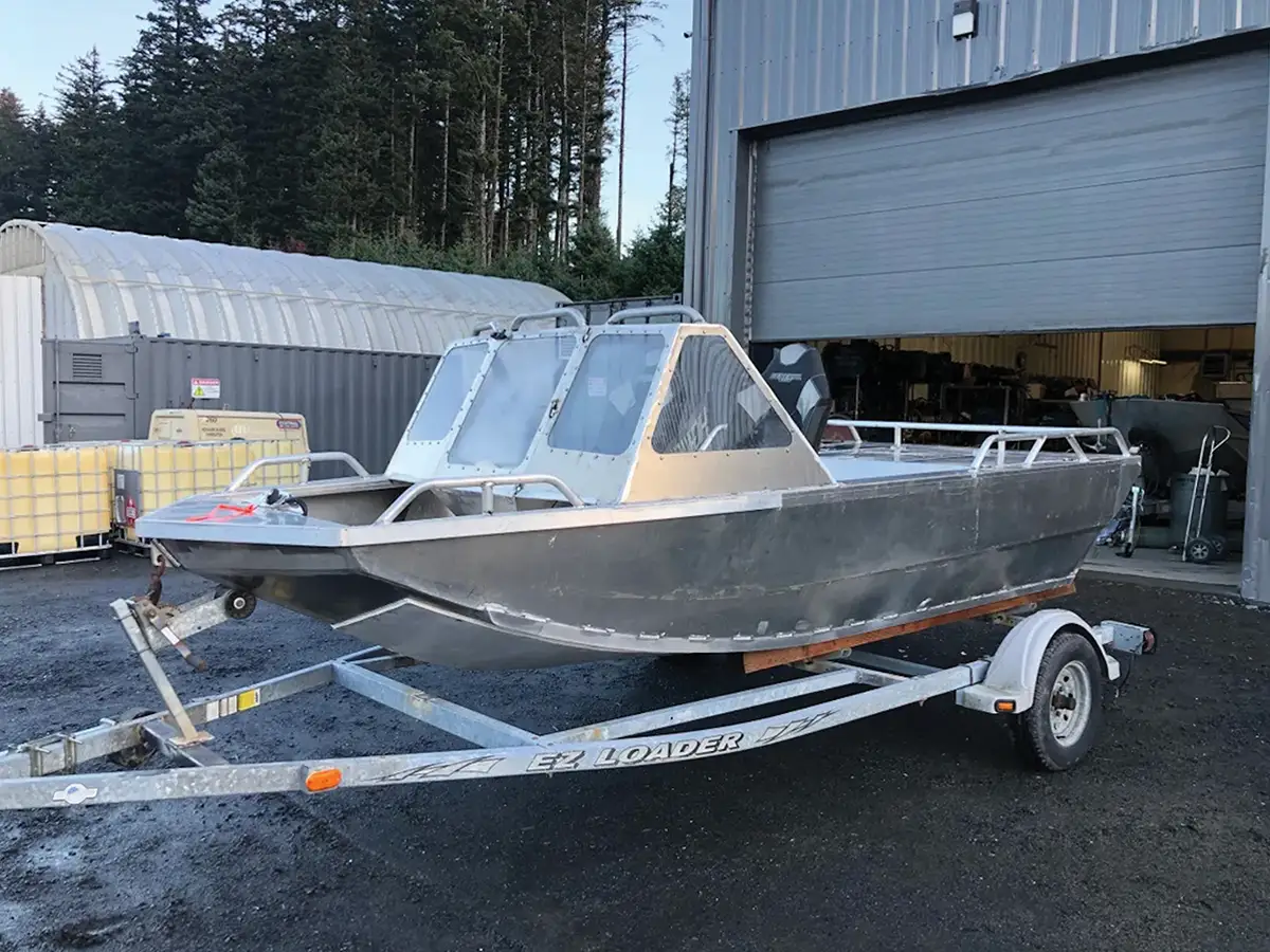 side view of a work in progress skiff