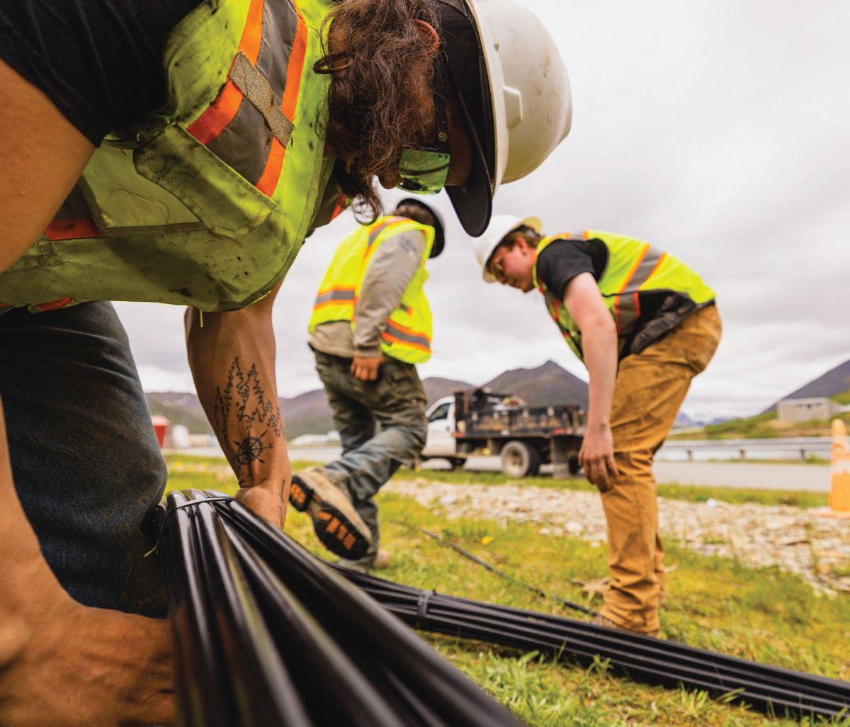 workers installing fiber
