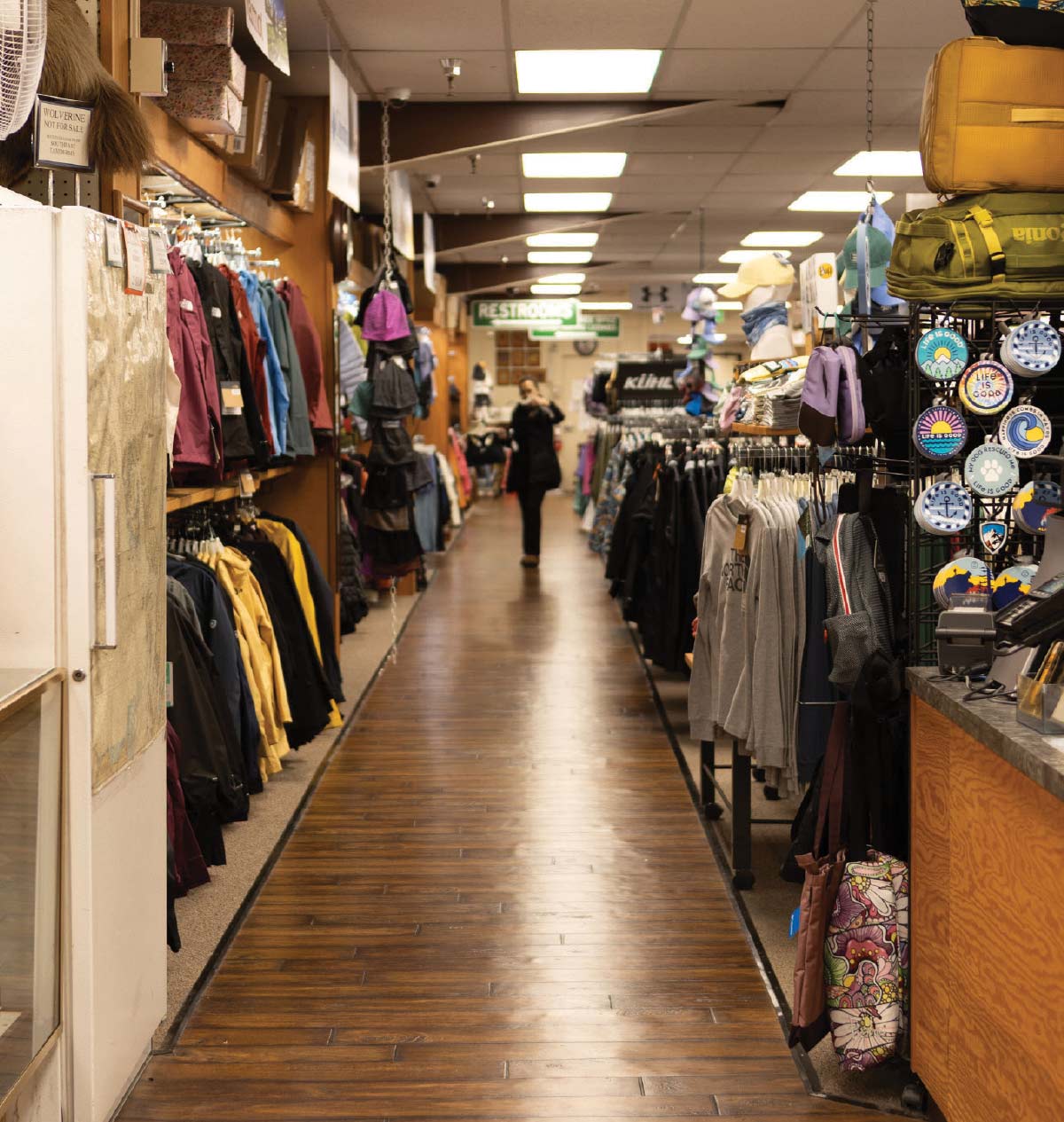 clothes hanging on walls and racks