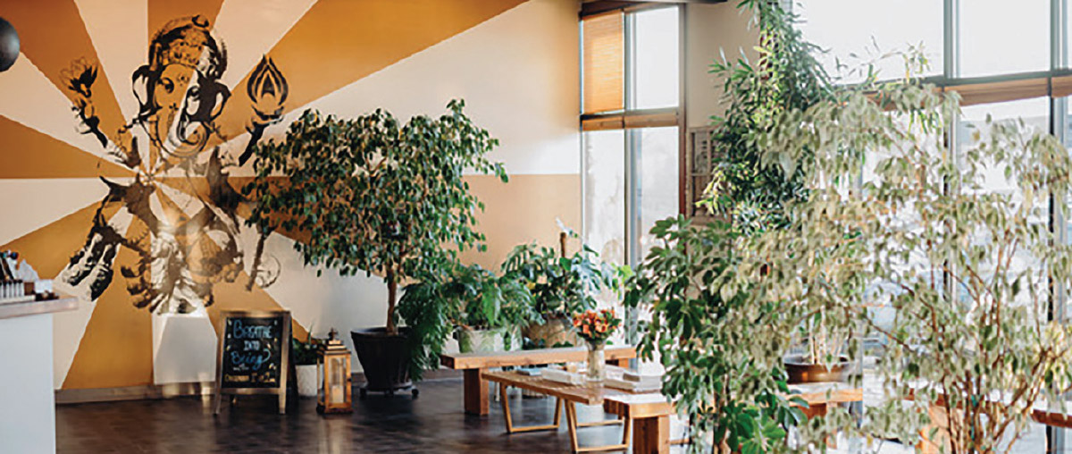 inside view of boutique accent wall and tables