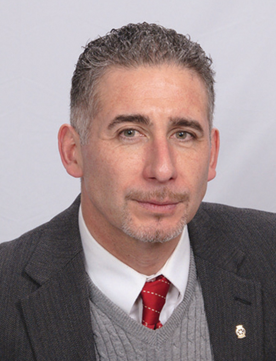 headshot of Carlos Machuca