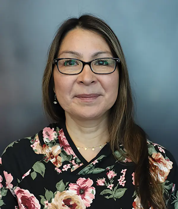 Headshot photograph of Andria Agli grinning