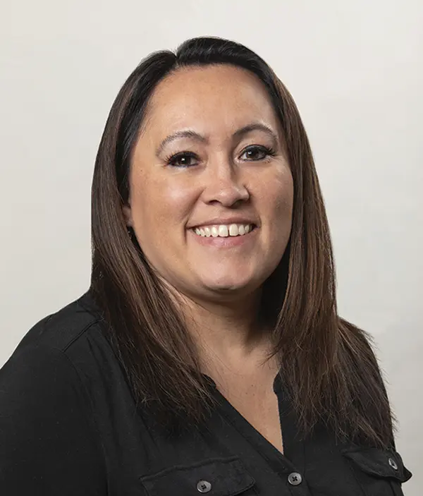 Headshot photograph of Carol Wren smiling