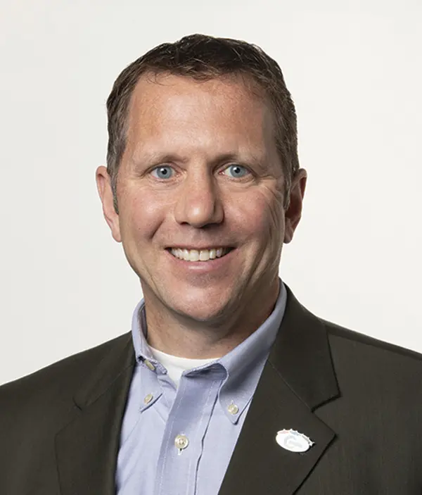 Headshot photograph of Daniel Cheyette smiling