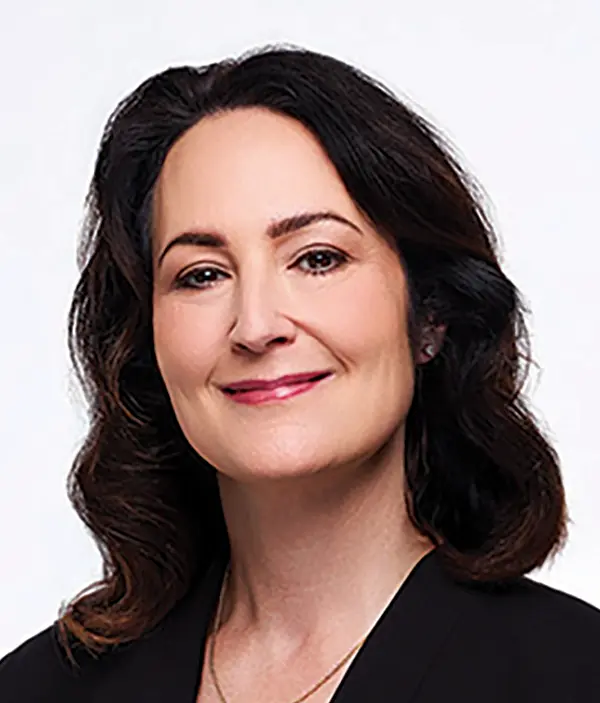 Headshot photograph of Jennifer Tungul grinning