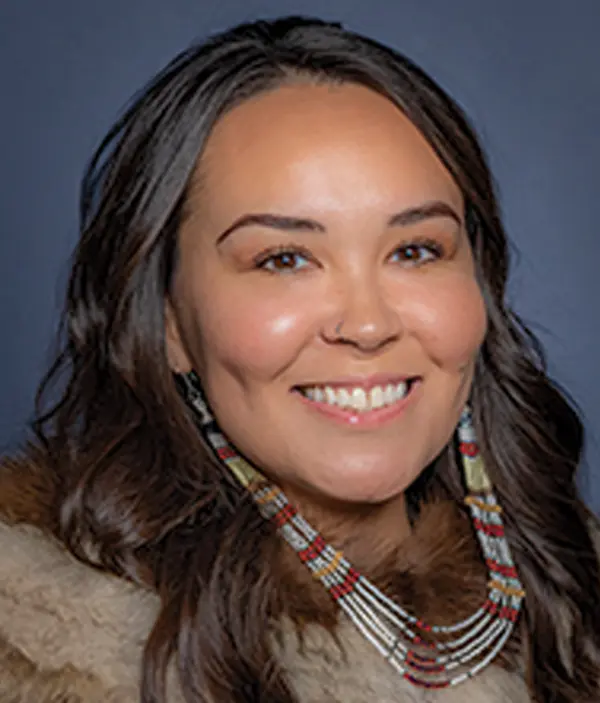 Headshot photograph of Kelsey Ciugun Wallace smiling
