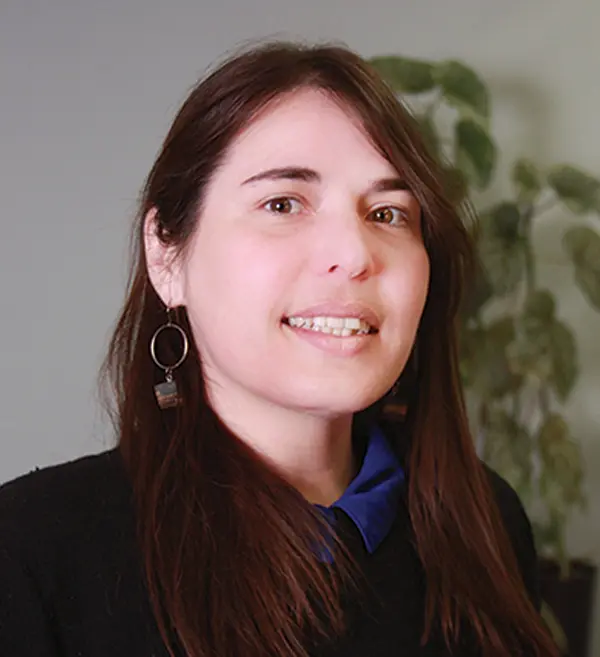 Headshot photograph of Janine Way smiling
