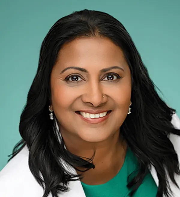 Headshot photograph of Vandana Ingle smiling