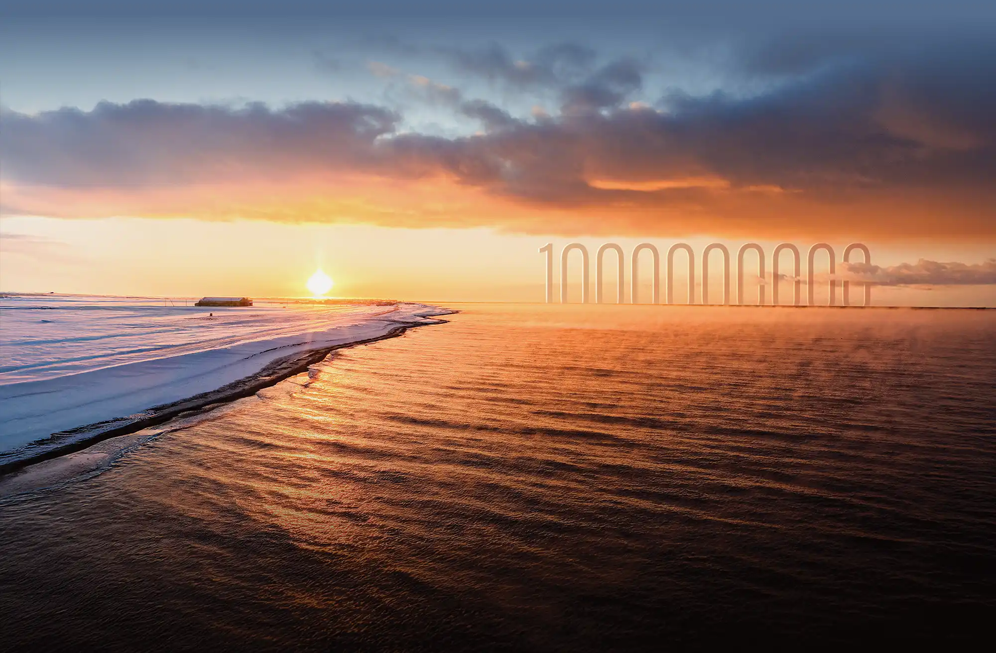 A stunning Arctic sunset over a partially frozen coastline with the number "1,000,000,000" subtly integrated into the distant horizon