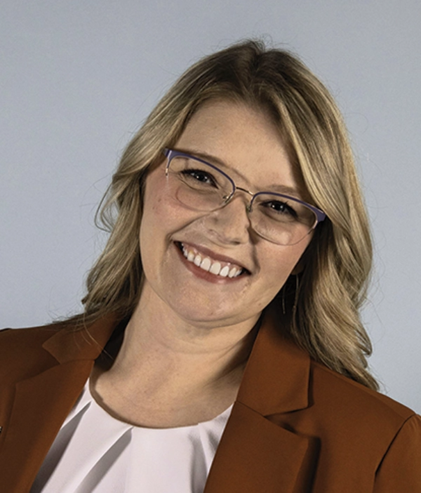 Headshot photograph of Annie Scott smiling