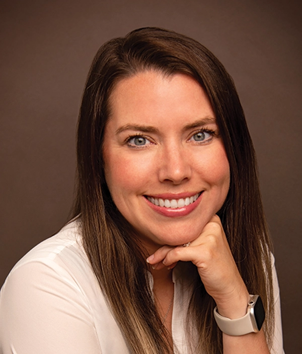 Headshot photograph of Danicia Shiryayev smiling