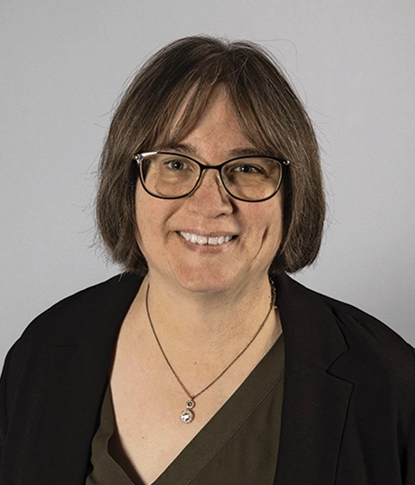 Headshot photograph of Lisa Smeltzer smiling
