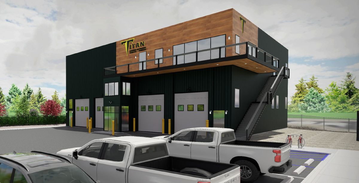 A detailed architectural rendering of the Titan building showing four large garage bays with white roll-up doors, an upper-level balcony with wood paneling, and white pickup trucks parked in the foreground.