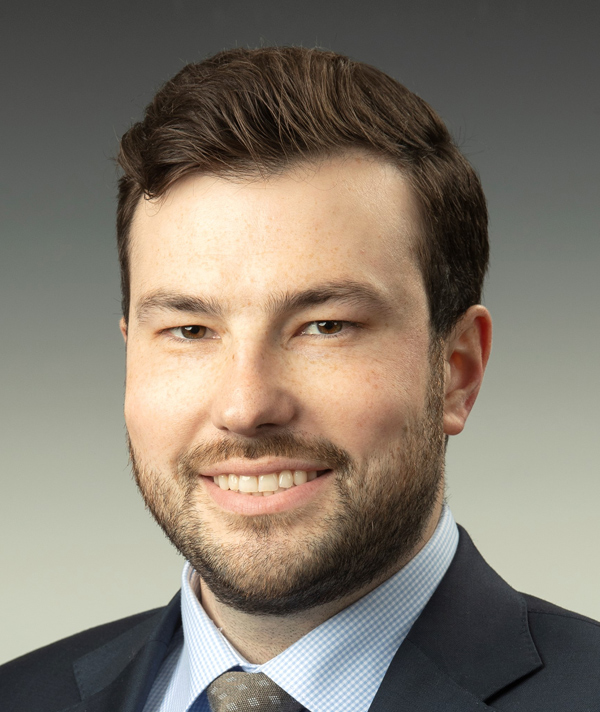Headshot photograph of Connor Hajdukovich smiling