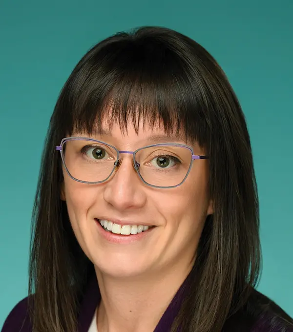 Headshot photograph of Csesalie Bates smiling