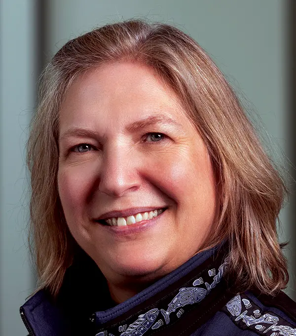 Headshot photograph of Gwen Welch smiling