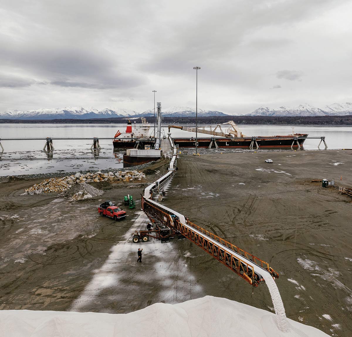 The 720-foot M/V Sheila Anne, the largest ship to dock at Port MacKenzie, offloads 66,000 tons of salt from Mexico in April for use on roads throughout the state.