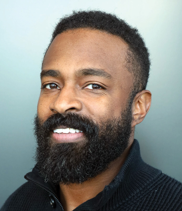 Headshot photograph of LaFewt Knox smiling