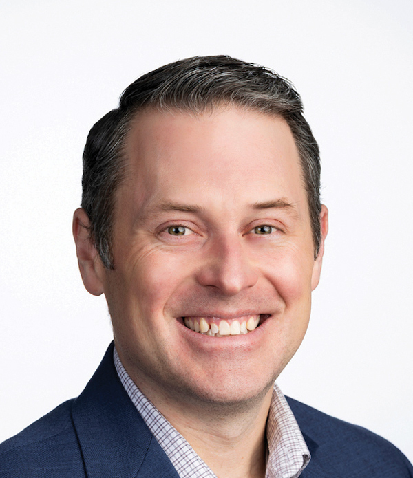 Headshot photograph of Mike Davis smiling