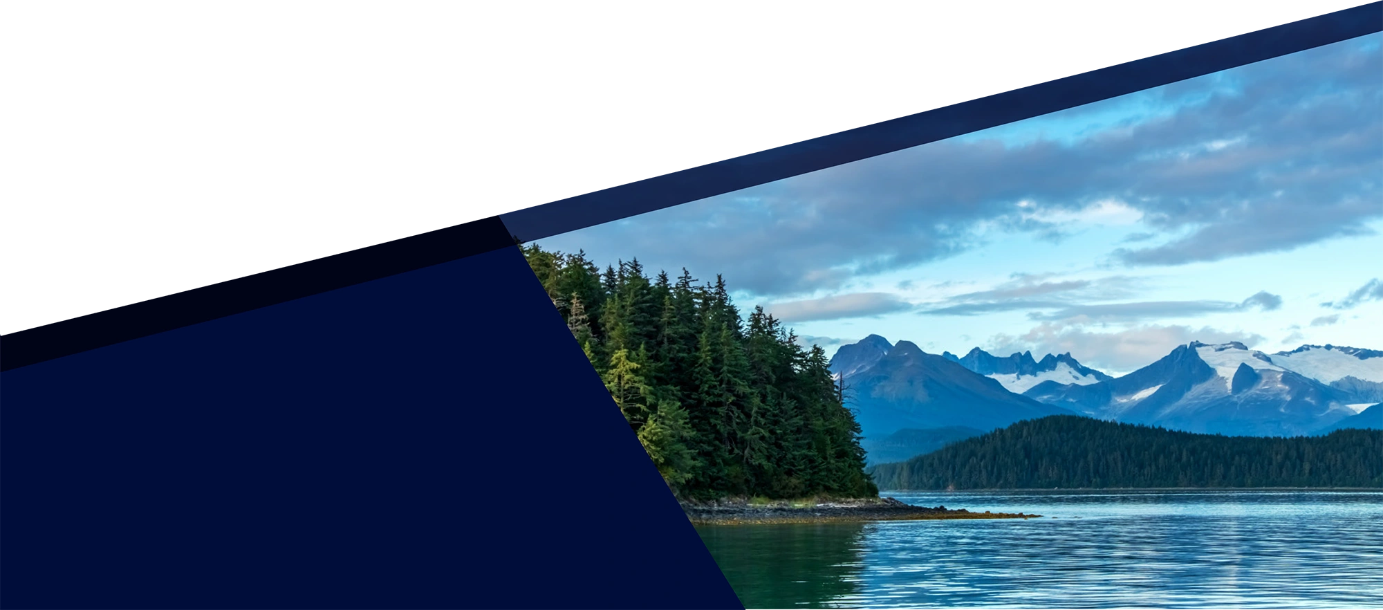 Coastal mountain landscape with dense evergreen pine forest along blue water, set within a dark blue diagonal graphic frame.