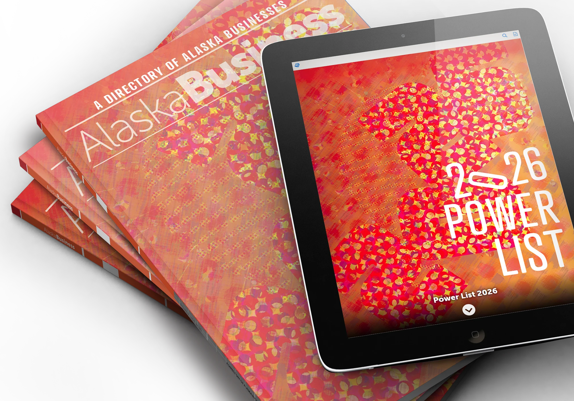 Print copies and a tablet display the 2026 Alaska Business Power List, a directory of Alaska businesses.