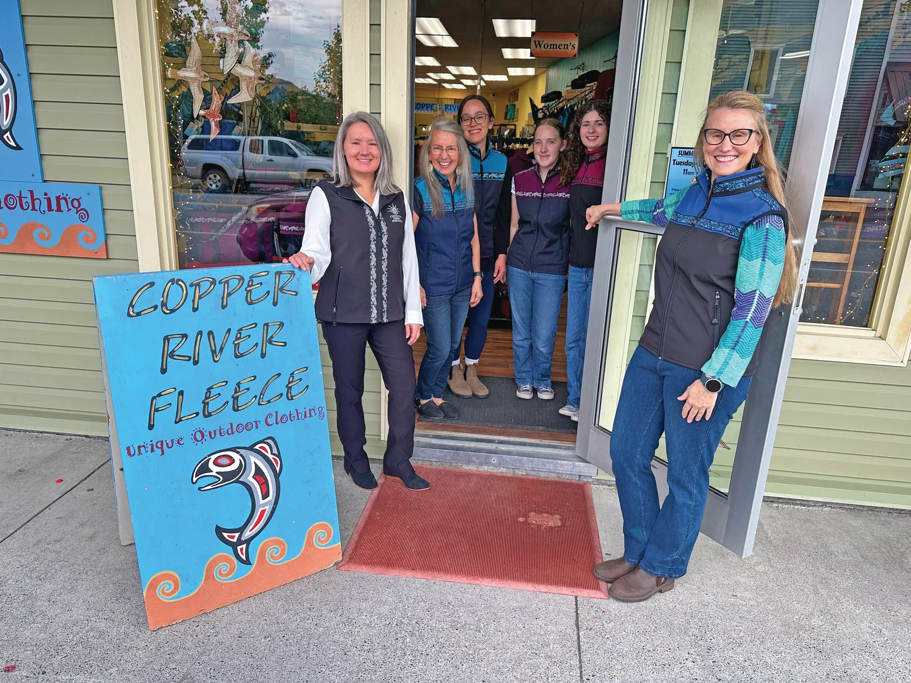 A natural fit: Chugach President Katherine Carlton (left) welcomes founder Jennifer Park (right) and the Copper River Fleece team as Chugach acquires the beloved Cordova apparel company in July 2026.